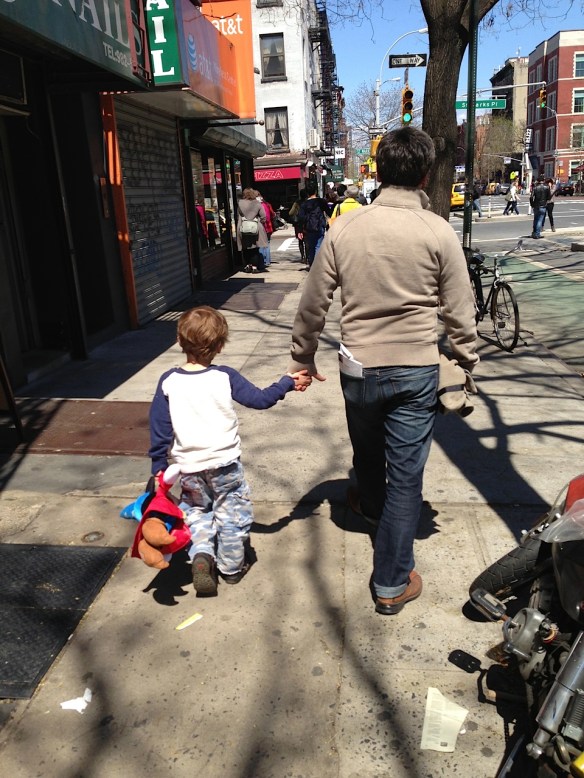 After we returned to New York, Martin enjoyed carrying his Mickey Mouse doll, as here on the Lower East Side with Adrian.