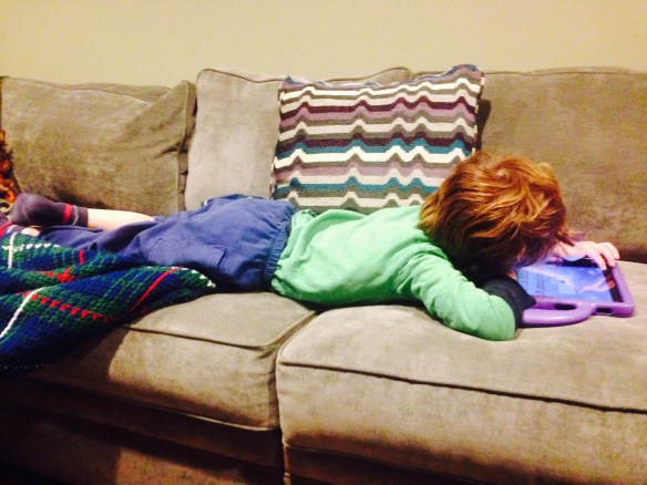 Martin, sick but managing his iPad.