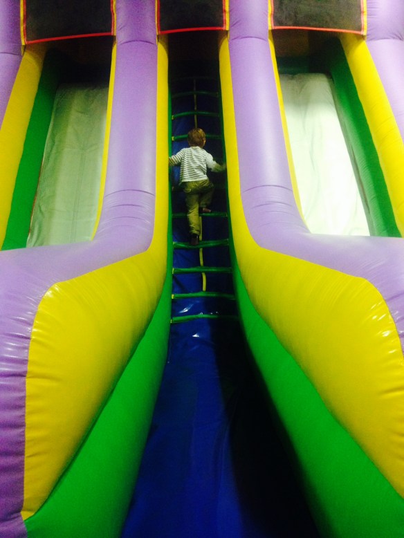 Martin heading up a slide. Sometimes I want to follow him onto these things. They look fun.