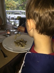 Kind of a funny shot of Martin, acting pretty typical while enjoying calamari in a restaurant.